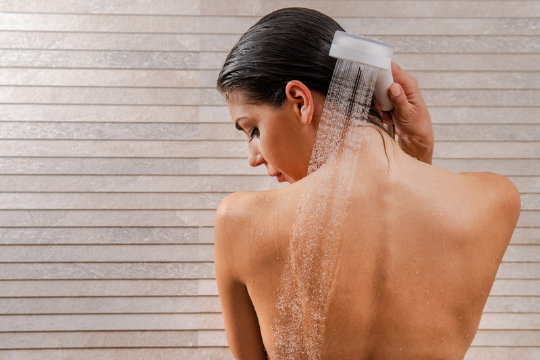 Showering with Lotus Shower Head